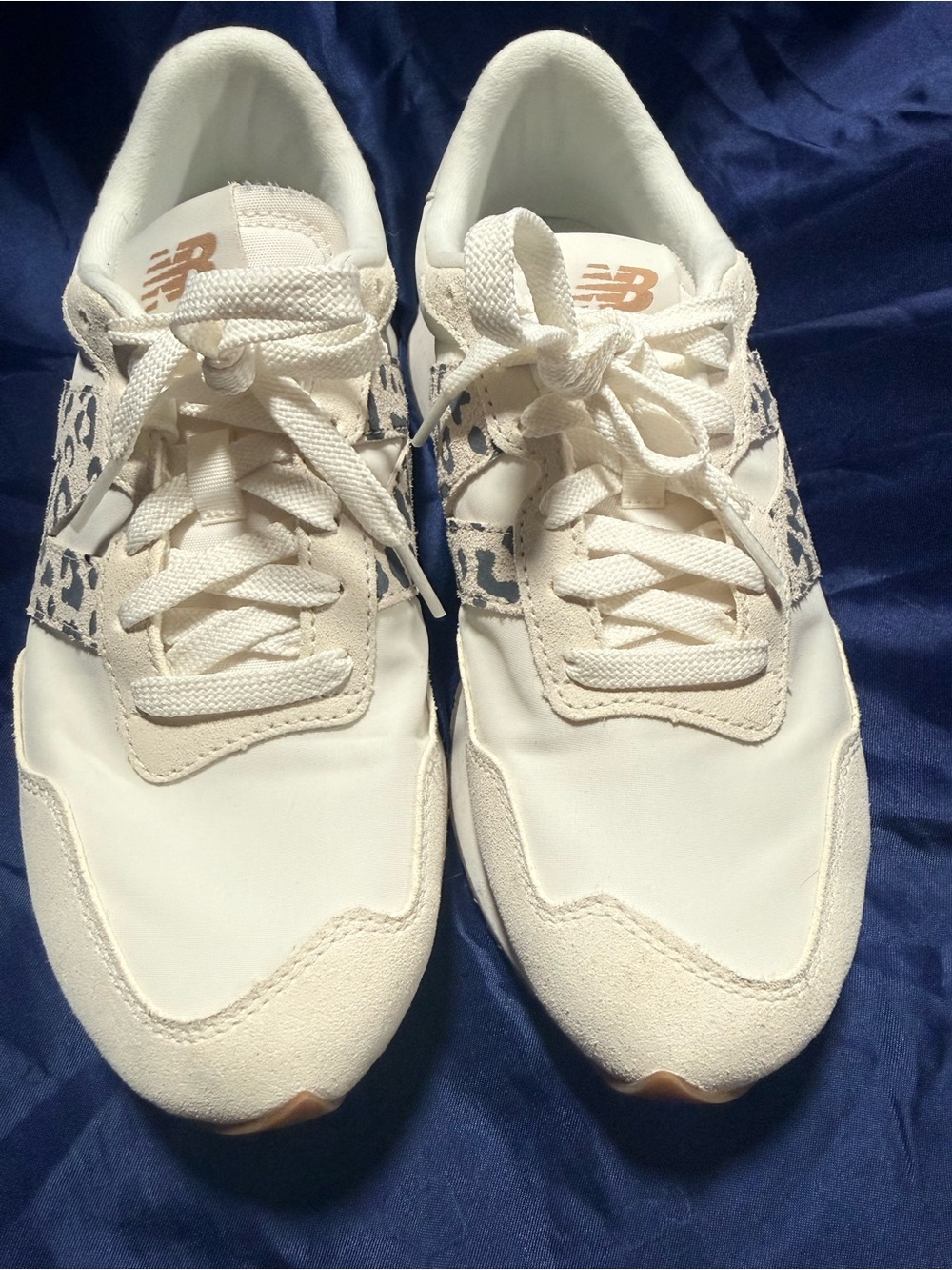 New Balance Women's Cream Sneakers with Navy Leopard Accent